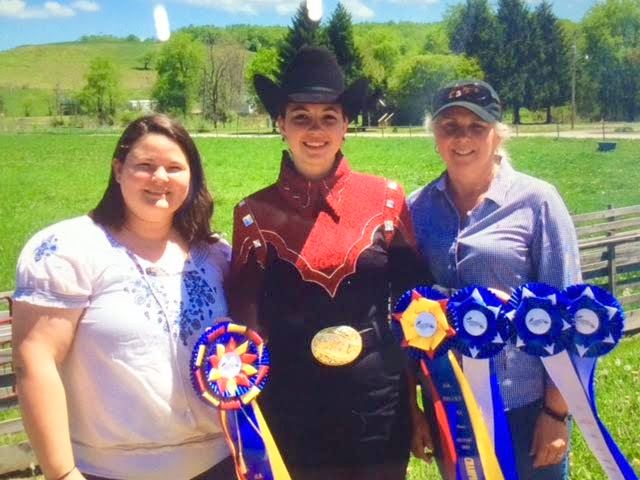 Addy with her two coaches.  Left is Rebekah Shaw.  Right is Ruth Finley.  Coaches of the Central Carolina Equestrian Team.  Both are from Lexington.  Rebekah is a USC graduate. She was a Gamecock Equestrian rider in the discipline of Reining.