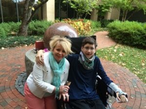 Bradley, with is mom, Fre at the Greenville Hospital Peace Garden.