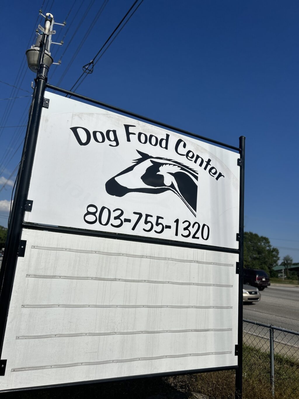 Dog Food Center owners in South Congaree delivering donated items to